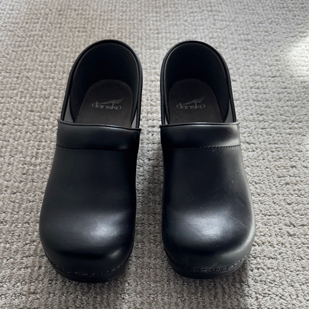 Dansko Sleek Black Leather Clogs